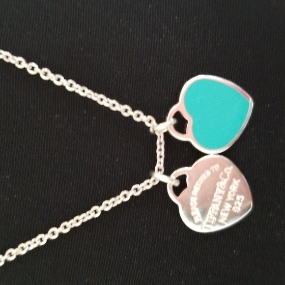 Tiffany & Co. Sterling silver Double heart pendant necklace.